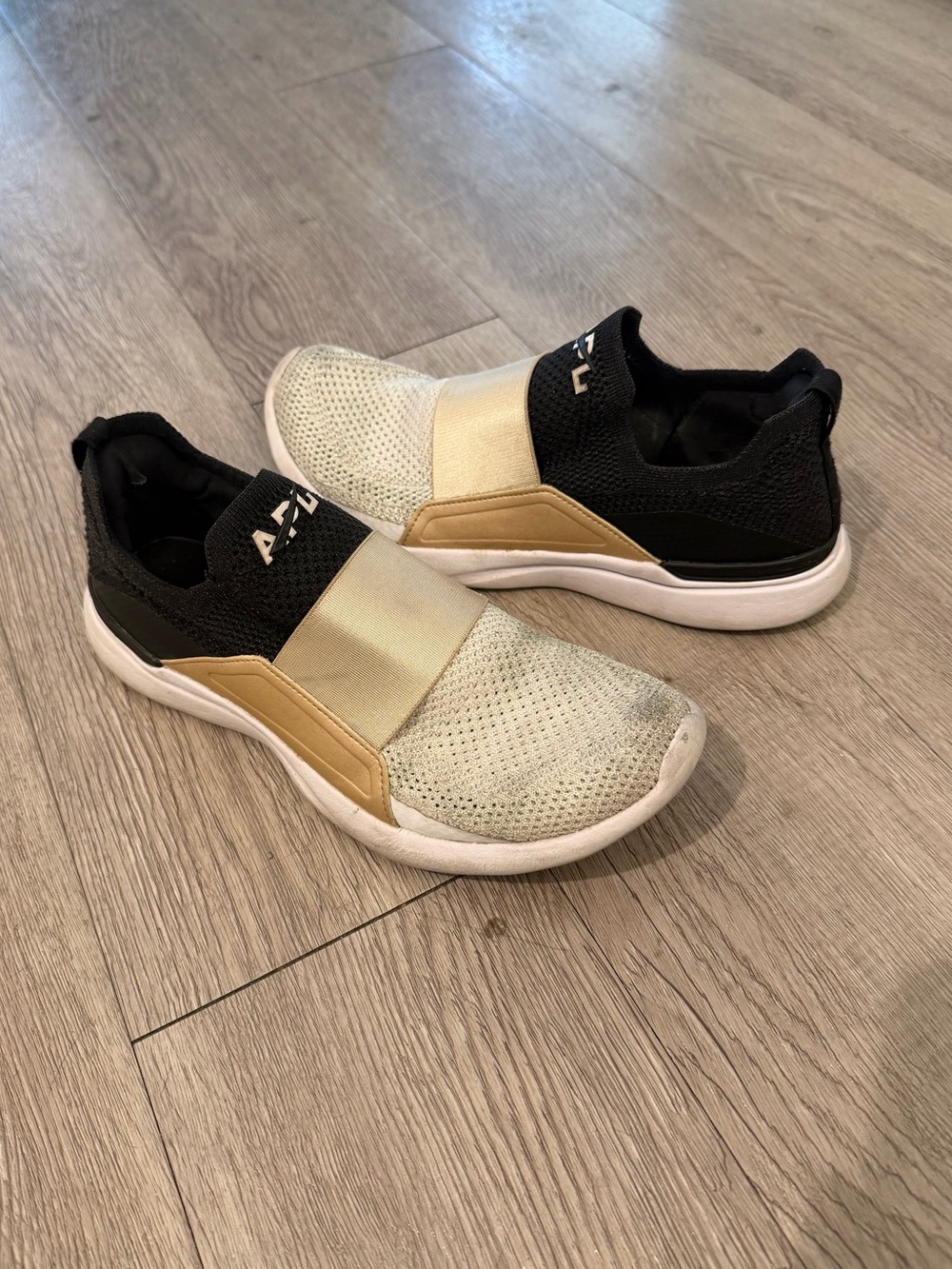 APL TechLoom Bliss Slip-On Sneakers in Black, Gold, Silver 8.5